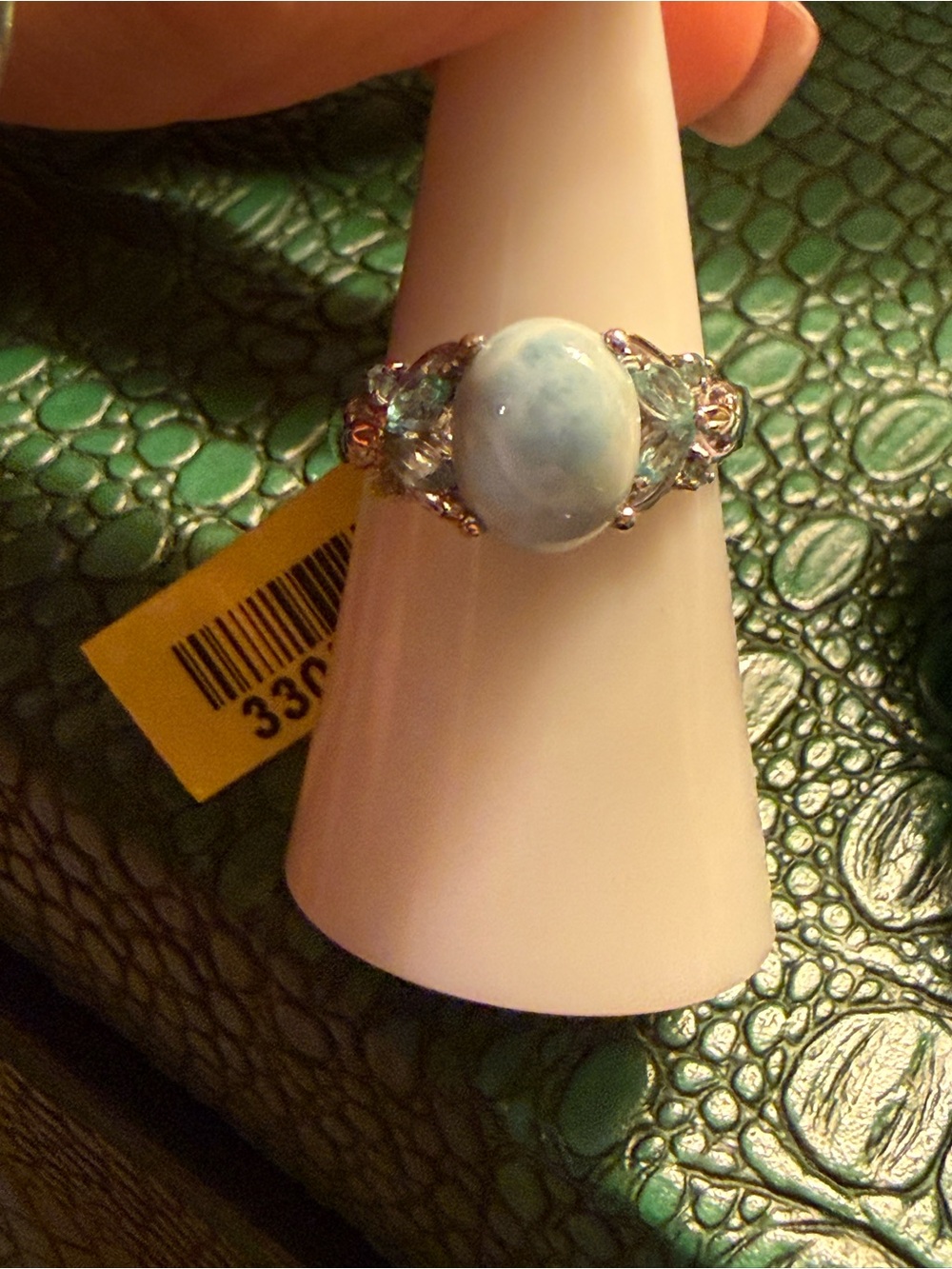 Sterling Silver Ring with Light Blue Larimar Stone and Sparkling Side Gems